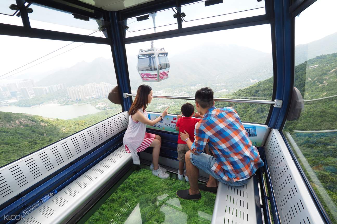 A family on Crystal Cabin coming to Ngong Ping